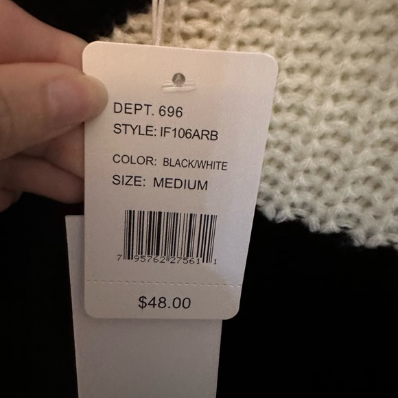 Black and white Sweater. Brand new. Size medium. Fringe sleeves and hem. - Picture 3 of 5